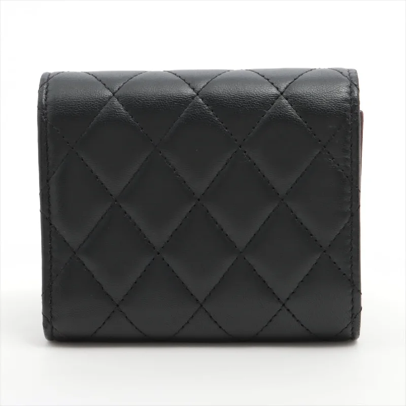 Chanel bags with exclusive seasonal designs and materialsChanel Black Lambskin Compact Wallet - Series 22