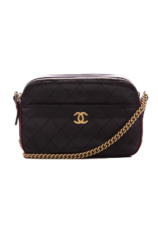 Chanel bags with iconic stitching detailsButton Up Camera Case Bag