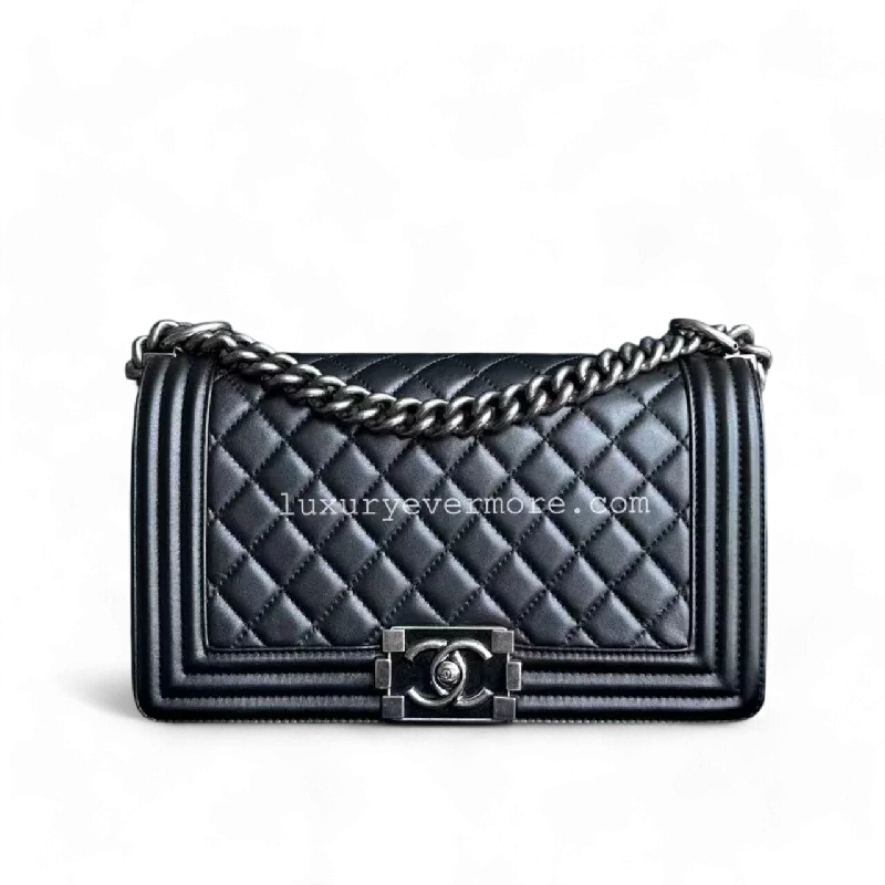 Chanel bags with gold, silver, and pearl accentsChanel Boy Medium - 25CM Quilted Calfskin Black Silver Hardware Series 20