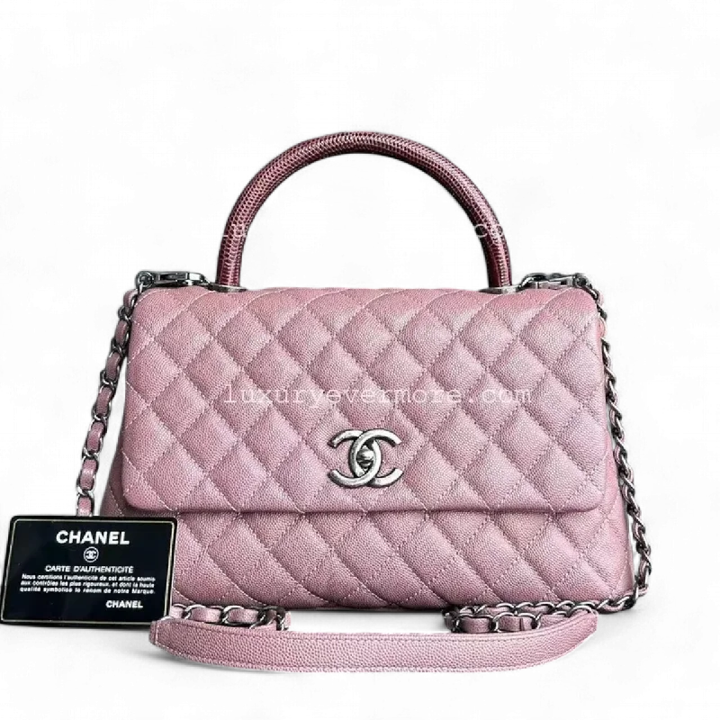 Chanel bags with the perfect balance of luxury and functionalityChanel Coco Handle - Medium Pink Lizard Handle Silver Hardware Series 23