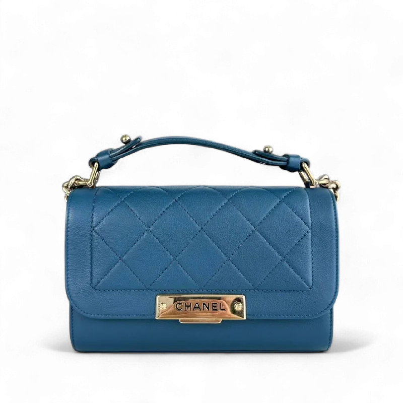 Chanel bags with iconic gold chainsChanel Label Click Flap - Small Quilted Calfskin Blue Gold Hardware Series 23