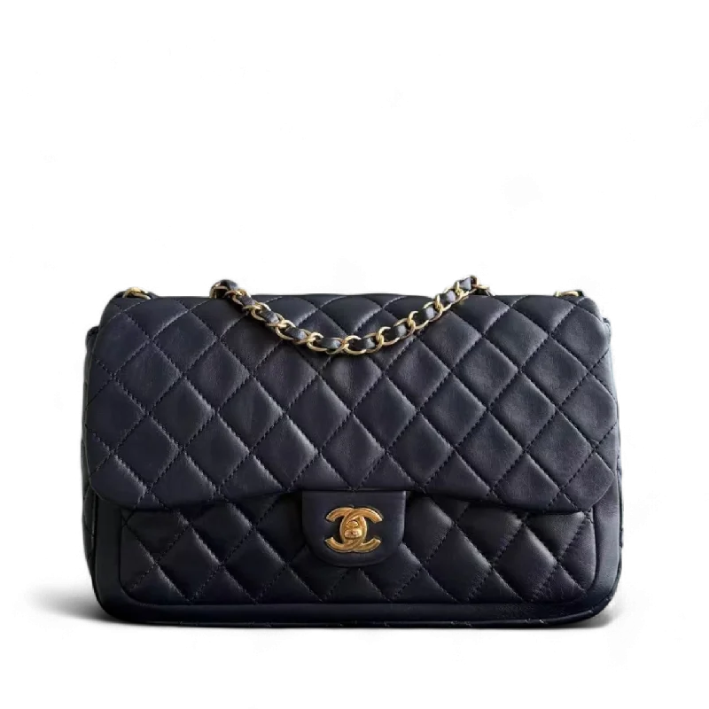 Chanel bags with gold, silver, and pearl accentsChanel Quilted Flap - Seasonal Single Flap Lambskin Dark Navy Blue Gold Hardware Series 18