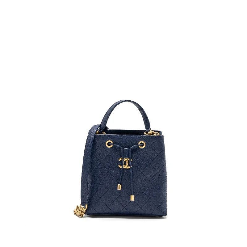 Chanel bags available in bold colors and patternsChanel Top Handle Drawstring Bucket Bag Caviar Navy GHW