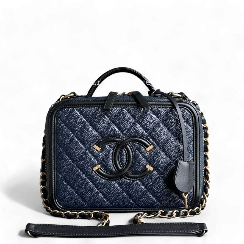 Chanel bags with iconic stitching detailsChanel Vanity Case Medium - Caivar Quilted Dark Blue Gold Hardware Series 26