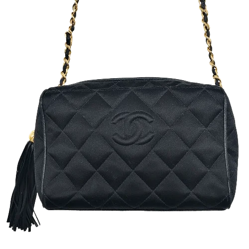 Chanel bags with gold, silver, and pearl accentsVintage Chanel Bag (COLLECTIBLE)