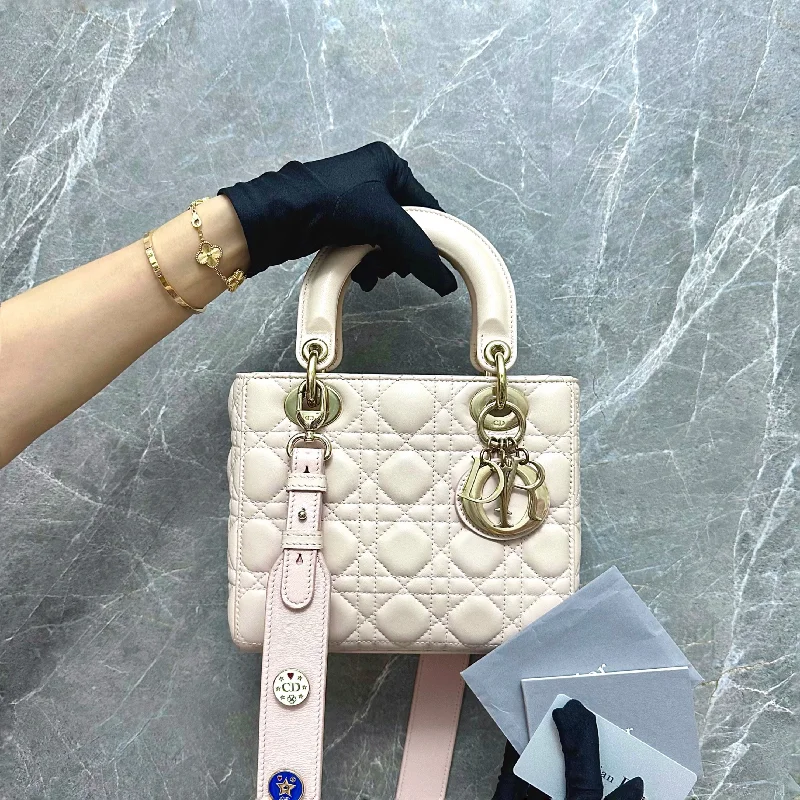 Christian Dior backpacks with a sleek, minimalist silhouetteLady Small Lambskin Charm ABC Powder Pink GHW